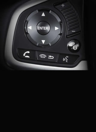 Multi-function control button mounted on steering wheel offer convenience-to-control audio switch and HandsFree Telephone (HFT) switch with voice recognition system operated easily by a fingertip
