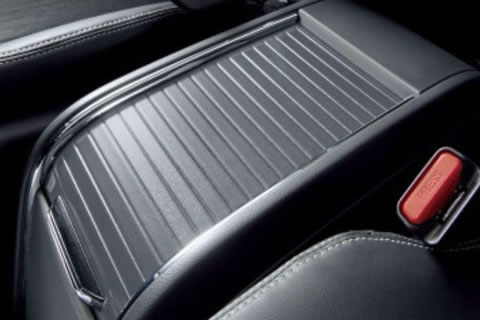 Center console storage with shutter slider