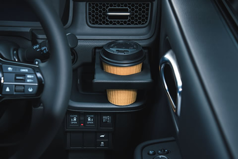 Driver seats coffee cup holder
